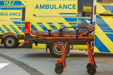 Ambulance car with stretcher for urgent help. High quality photo clipart