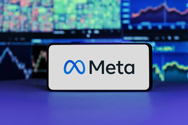 meta logo on mobile phone screen company shares rise or fall on stock exchange market: London, United Kingdom - 2024 November 6