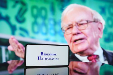 Berkshire Hathaway company and Warren Buffett in background. December 5, 2024 clipart