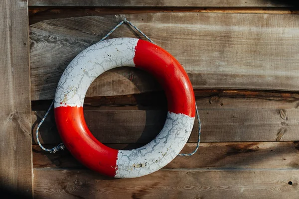 stock image Life preserver hanging on the wooden wall