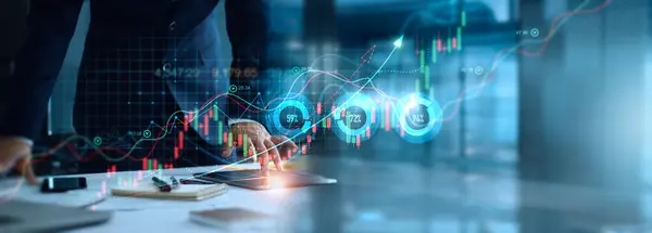 Businessman analyzing stock market trend and economic graph indicators to achieve sustainable growth in financial investment. Successful business performs effective decision making strategy.