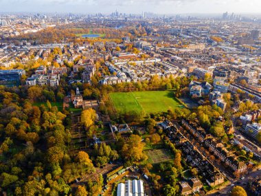 Aerial view of West Kensigton and Hyde park in London in autumn, England, UK clipart