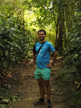 young man in costa rica rainforest