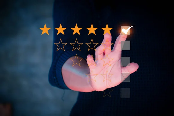 Customer review concept. Businessman hand with rating stars. Customer experience. Customer service evaluation concept. rating very impressed.