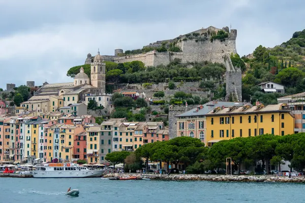 stock image Portovenere, Italy, July 30, 2023. View, from the sea, of the village of Portovenere with the Doria castle