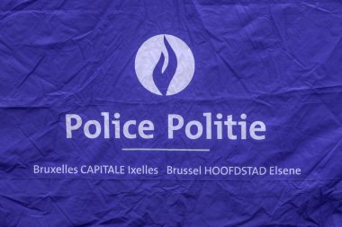 Brussels, Belgium, September 22, 2024. Brussels area police, capital Ixelles. Inscription on a tent in the street. clipart