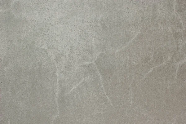 Sulandırılmış beyaz ve beton duvarlarda izler.