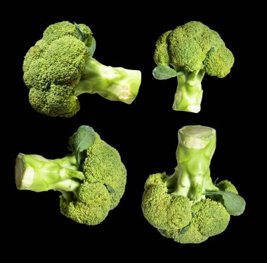 Brokoli ya da karnabahar kesme yolu ile izole siyah arka plan, gölge yok, yemek malzemeleri, sağlıklı sebzeler