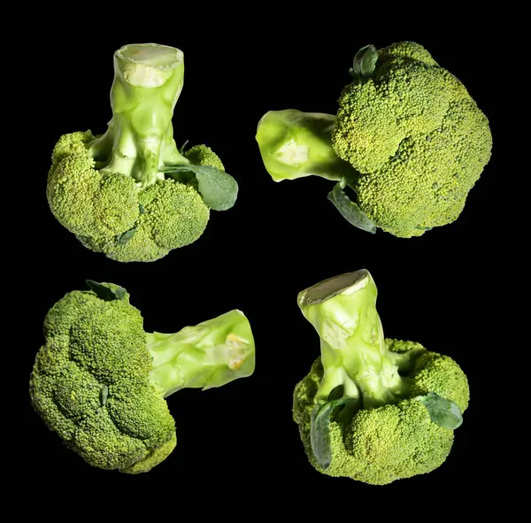 Brokoli ya da karnabahar kesme yolu ile izole siyah arka plan, gölge yok, yemek malzemeleri, sağlıklı sebzeler