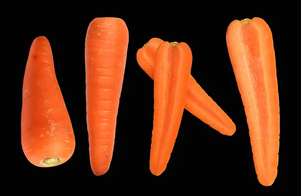 Carrot isolated with clipping path, no shadow in black background, fresh raw vegetables