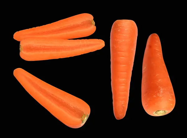 Carrot isolated with clipping path, no shadow in black background, fresh raw vegetables