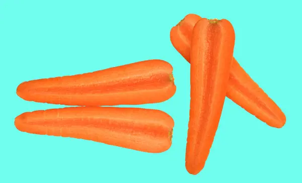 Carrot isolated with clipping path, no shadow in green background, fresh raw vegetables