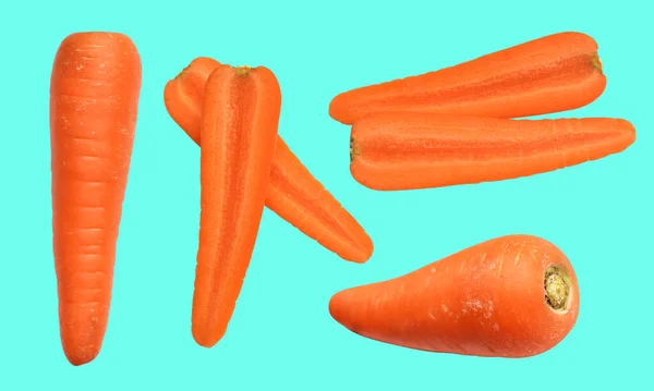 Carrot isolated with clipping path, no shadow in green background, fresh raw vegetables