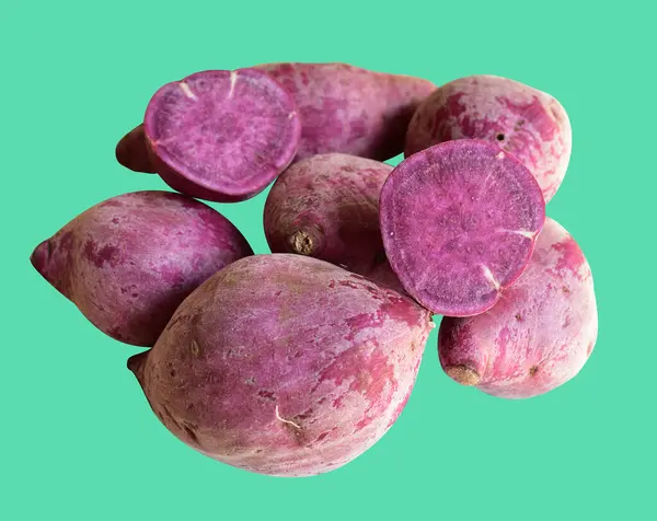 Purple sweet potato isolated with clipping path, no shadow in green background, healthy food