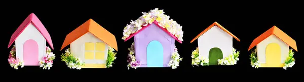 Handmade paper house isolated with clipping path, no shadow in black background
