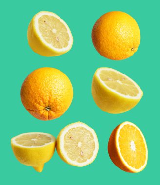 Yeşil arka planda kırpma yolu olan sarı limon ve portakal meyvesi. Gölgesi yok, sağlıklı meyve dilimleri var.