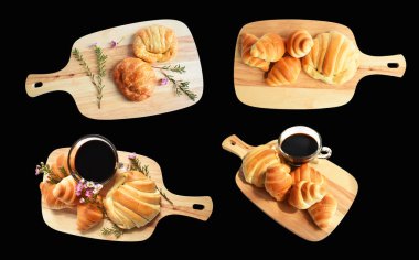 Tahta kesme tahtasına izole edilmiş peynirli kruvasan. Siyah arka planda gölge yok. Ev yapımı tatlı.