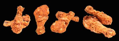 Kızarmış tavuk budu, kırpma yolu ile izole edilmiş, siyah arka planda gölge yok, fast food