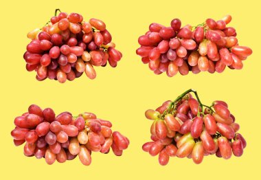 Kırmızı üzüm izole edilmiş, sarı arka planda kırpma yolu olmayan, sağlıklı taze meyve.