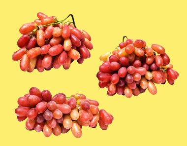 Kırmızı üzüm izole edilmiş, sarı arka planda kırpma yolu olmayan, sağlıklı taze meyve.