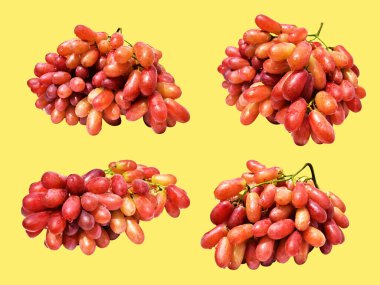 Kırmızı üzüm izole edilmiş, sarı arka planda kırpma yolu olmayan, sağlıklı taze meyve.