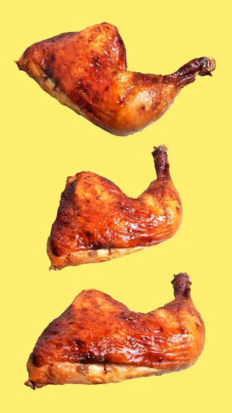 Grilled chicken quarter leg with sauce isolated, clipping path, no shadow in yellow background