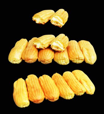 Eklemeler siyah arka planda izole edilmiş. Kesme yolu, tatlı yemek ve fırın yok.