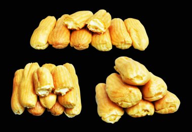 Eklemeler siyah arka planda izole edilmiş. Kesme yolu, tatlı yemek ve fırın yok.