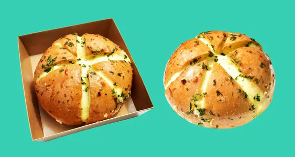 Korean cream cheese garlic bread in Kraft box food isolated with clipping path, no shadow in green background, bakery pastry bread