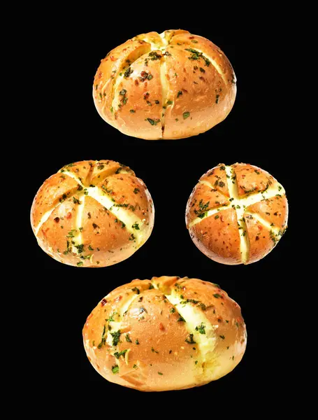 Korean cream cheese garlic bread isolated with clipping path, no shadow in black background, bakery pastry bread