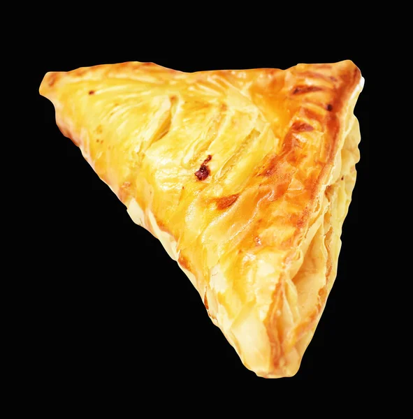 Puff pastry triangle isolated cheese  flaky pastry filled with pork meat with clipping path, no shadow in black background