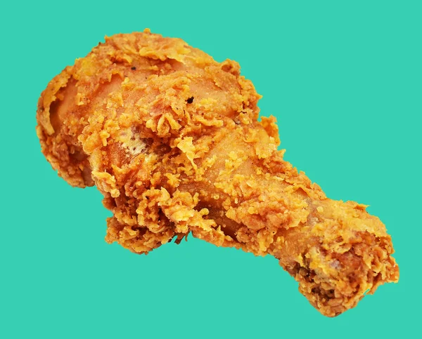 Kızarmış tavuk budu, kırpma yolu ile izole edilmiş, yeşil arka planda gölge yok, fast food