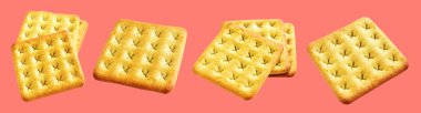 Square crackers isolated or biscuits, butter cookies with clipping path, no shadow in pink background