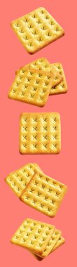 Square crackers isolated or biscuits, butter cookies with clipping path, no shadow in pink background