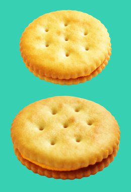 Yuvarlak krakerler ya da bisküviler, kesme yolu olan tereyağlı kurabiyeler, yeşil arka planda gölge yok