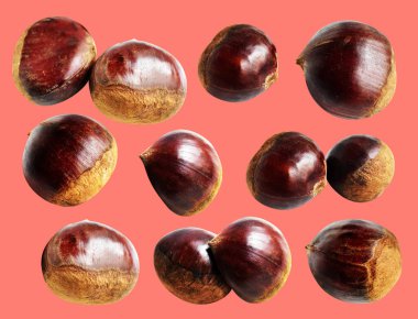 Kırpma yolu ile izole edilmiş kestane, pembe arka planda gölge yok, taze ve sağlıklı yiyecek.