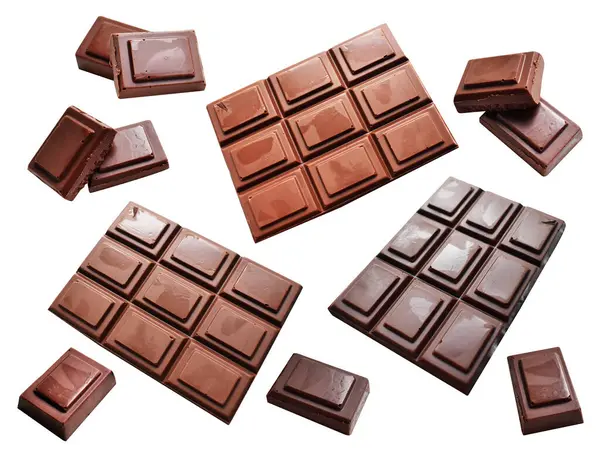 Milk chocolate pieces isolated with clipping path, no shadow in white background, cooking ingredient, homemade sweet dessert