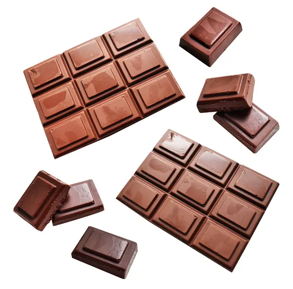 Milk chocolate pieces isolated with clipping path, no shadow in white background, cooking ingredient, homemade sweet dessert
