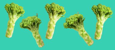 Brokoli ya da yeşil karnabahar yeşil arka planda kırpma yolu ile izole edilmiş, gölge yok, yemek malzemeleri, sağlıklı sebzeler
