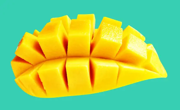 Mango slice cube isolated  with clipping path, no shadow in green background, mango cut to cube pieces, healthy tropical fruit