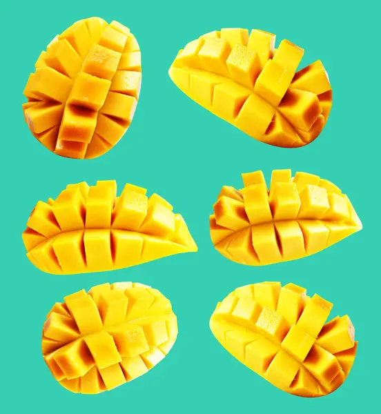 Mango slice cube isolated  with clipping path, no shadow in green background, mango cut to cube pieces, healthy tropical fruit