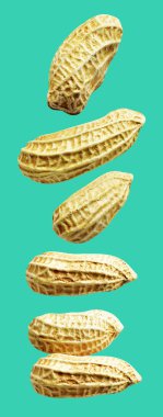 Kesme yolu ile izole edilmiş fıstıklar, yeşil arka planda gölge yok, yemek malzemeleri, sağlıklı yiyecekler.