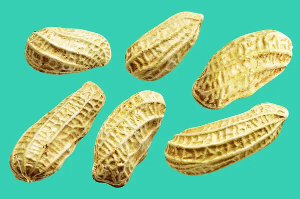 Kesme yolu ile izole edilmiş fıstıklar, yeşil arka planda gölge yok, yemek malzemeleri, sağlıklı yiyecekler.