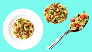 Kırpılmış bir kaşık kızarmış pirinç, yeşil arka planda gölge yok. Çin pilavı, karışık sebze, yumurta ve sosis (Yangzhou tarzı).)