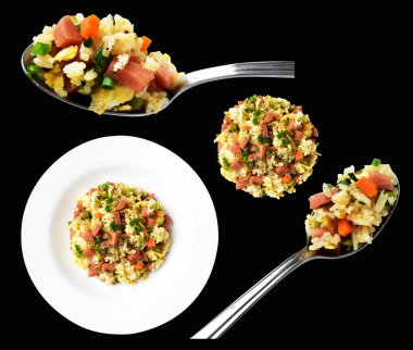 Kırpılmış pirinç, siyah arka planda gölge yok. Çin pilavı, karışık sebze, yumurta ve sosis (Yangzhou tarzı).)