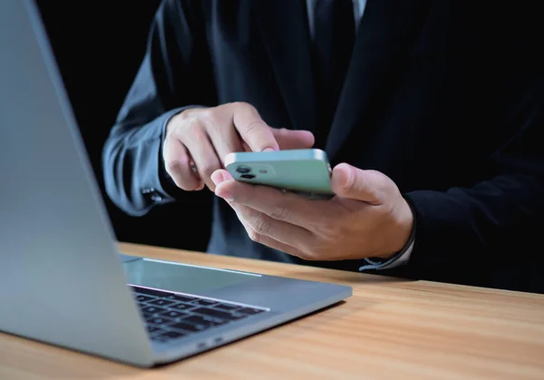 stock image Businessman using phone and computer for work. Business concept. communication concept