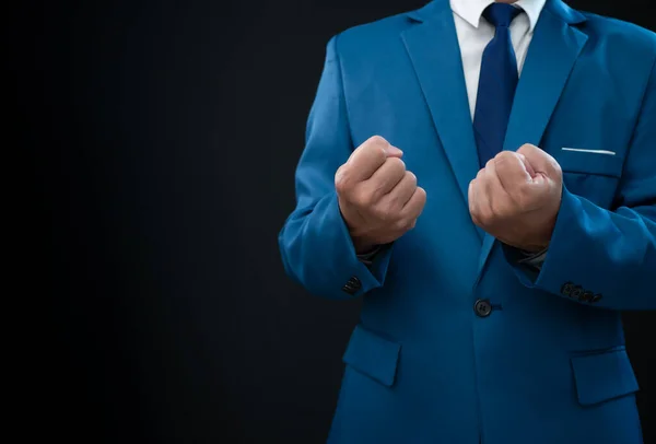 Businessman Blue Suit Showing Fist Fresh Background — Stock Photo, Image