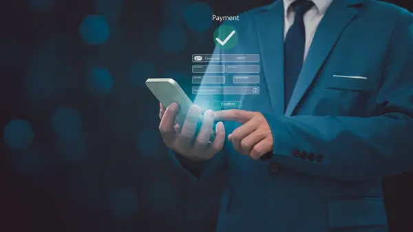 Digital banking network, internet payment, financial technology. Businessman Businessman pointing his finger at icons on virtual screen, online shopping and payment via mobile banking apps.