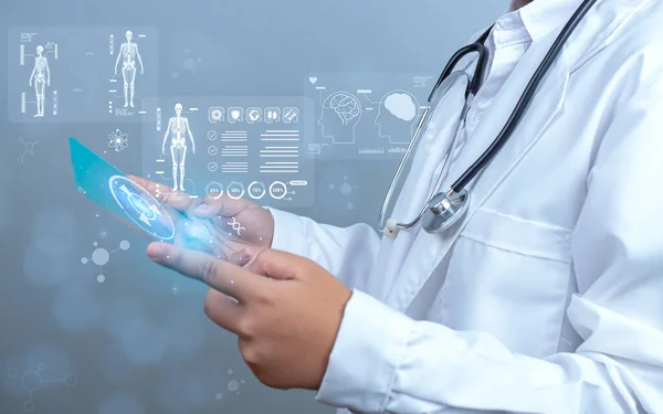 Doctor is using show screen for medical diagnostic analysis on modern virtual screen network connection. Medical technology concept.