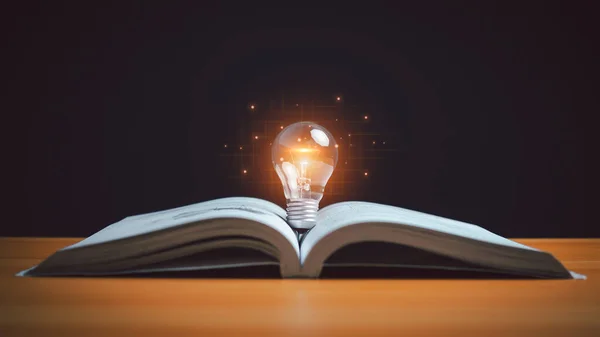 Educational knowledge and business education ideas, glowing light bulb on a book, Inspiring from read concept, self-learning, knowledge and searching for new ideas, Thinking for new idea, Innovations.